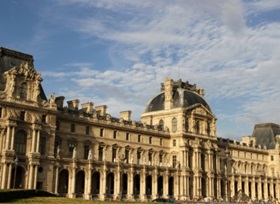 palais du louvre in paris guidebook